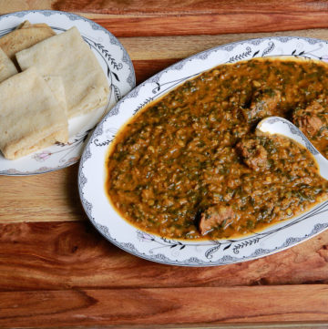 Rijla; purslane with red lentils stew serve with Kisra