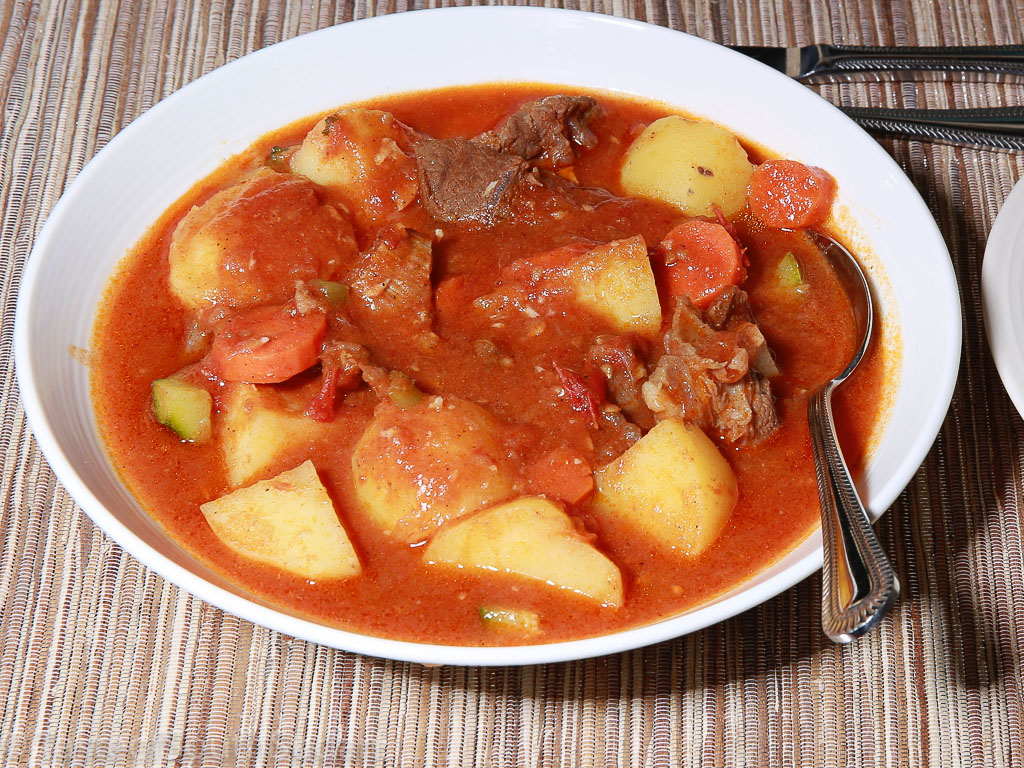 Pictured above is a dish of lamb stew with potatoes and carrots. South Sudan food, Sudanese food, North African recipes.