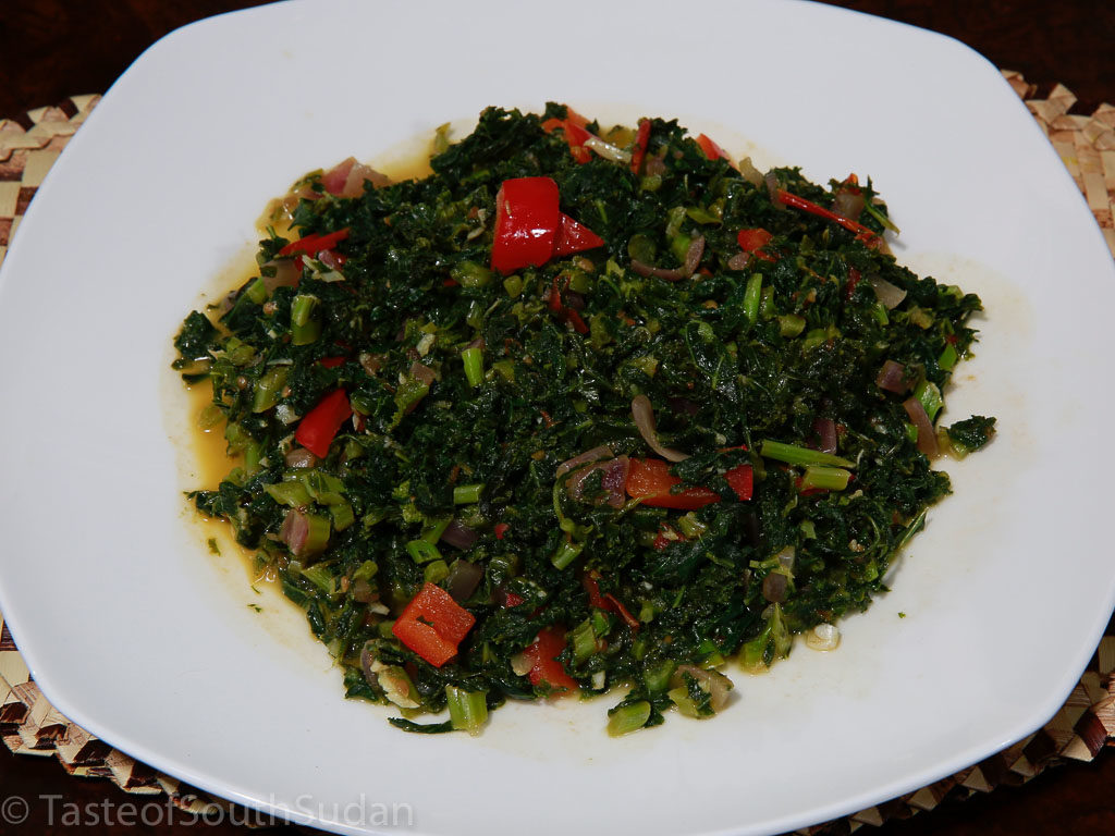 Pictured above is a dish of sukuma wiki, kale recipe, South Sudanese food, Kenyan food