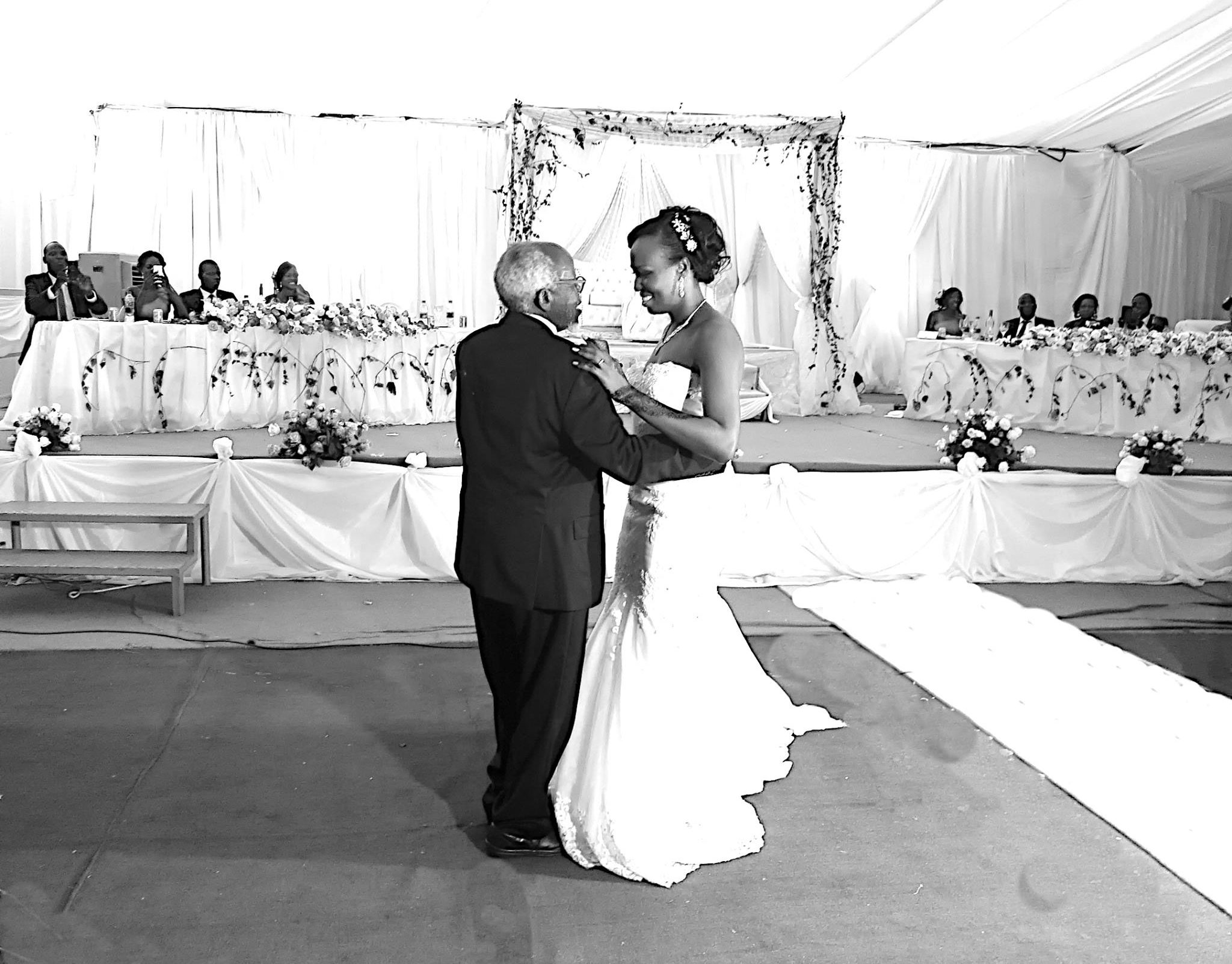 Taste of South Sudan photo of father and daughter dance