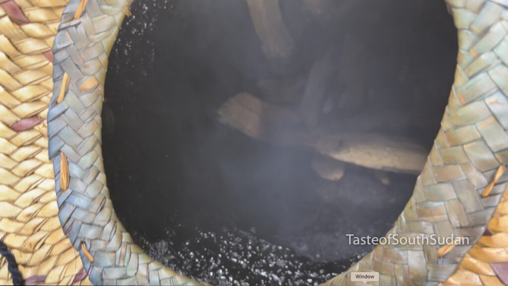 Dukhan smoke bath pit. See the depth of the pit and the talih wood set to smoke
